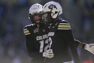Travis Hunter, left, Shedeur Sanders, right, during Oklahoma State v Colorado - Source: Getty